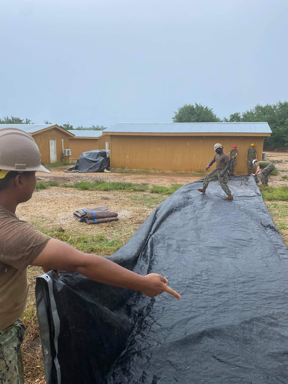 U.S. Navy Seabees with NMCB-5 and U.S. Marines with 7th ESB support projects in Tinian, Northern Mariana Islands