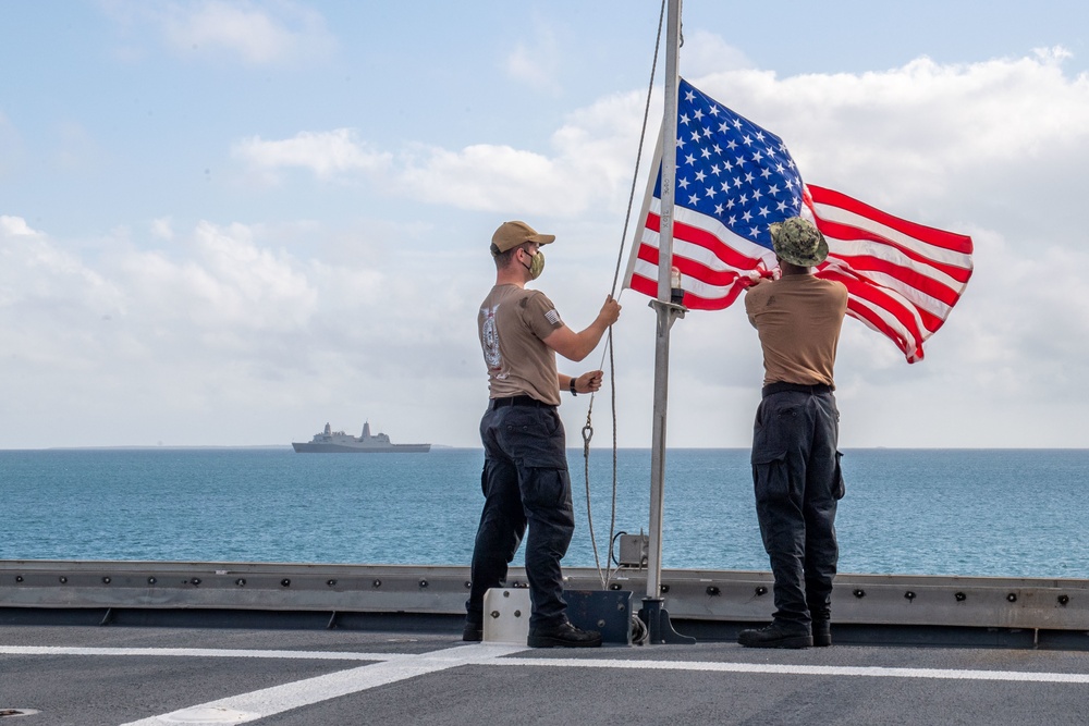 USS Charleston Sailors Shift Colors