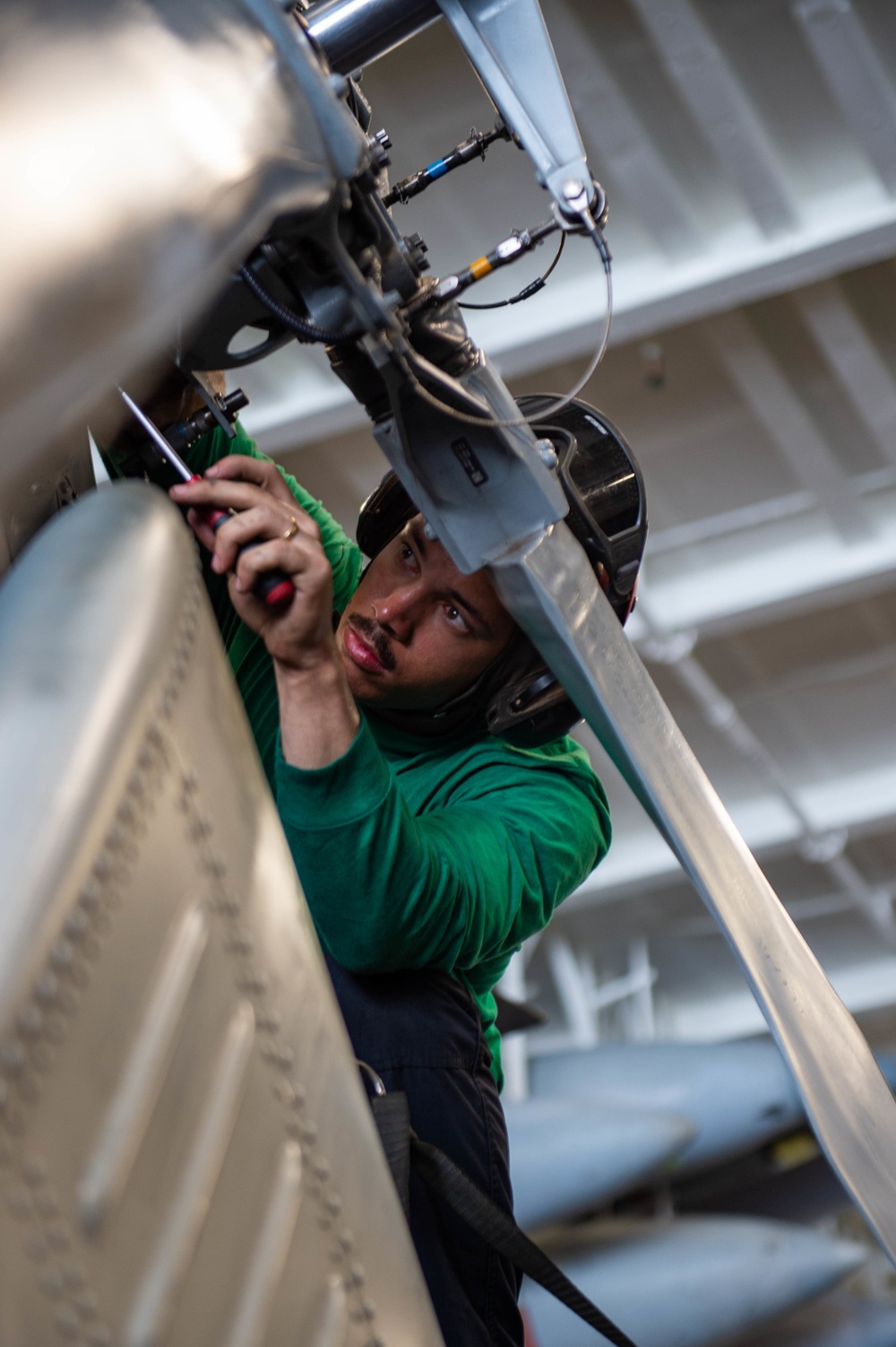 USS Carl Vinson (CVN 70) Sailor Conducts Maintenance