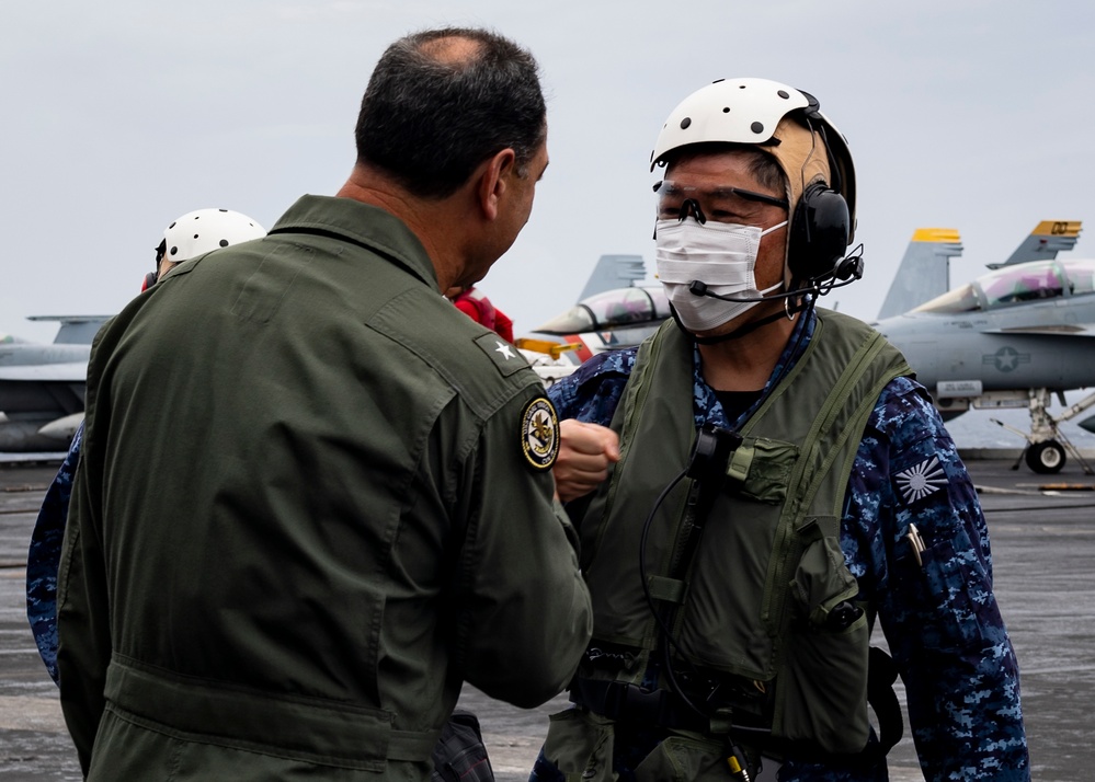 Rear Adm. Izura Ikeuchi, commander, Escort Flotilla Three, visits USS Carl Vinson (CVN 70)