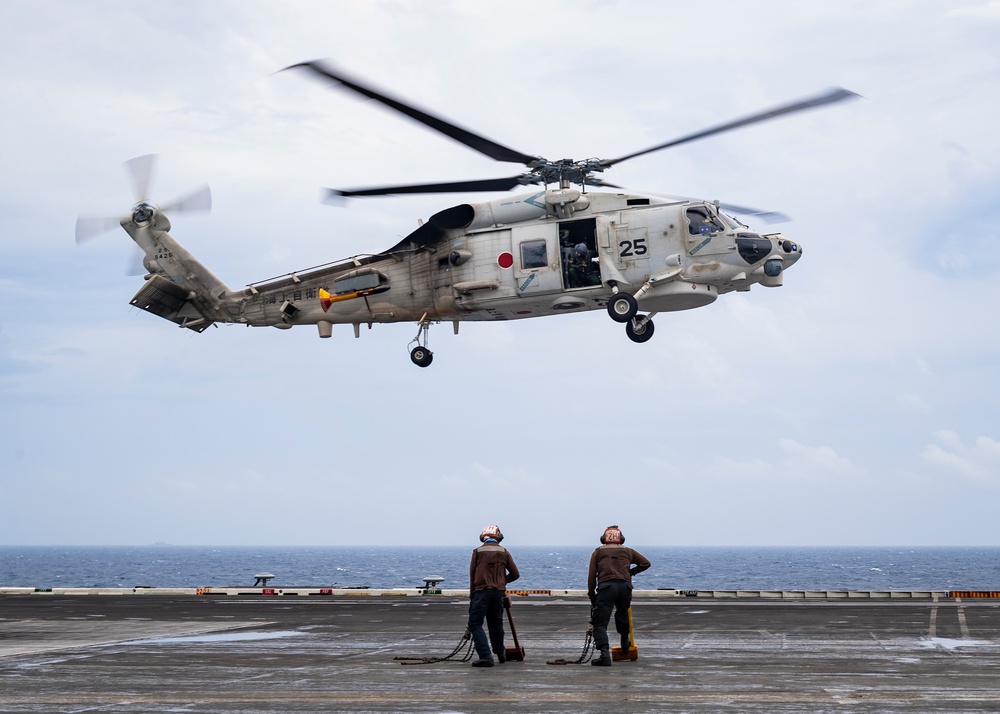 Rear Adm. Izura Ikeuchi, commander, Escort Flotilla Three, visits USS Carl Vinson (CVN 70)