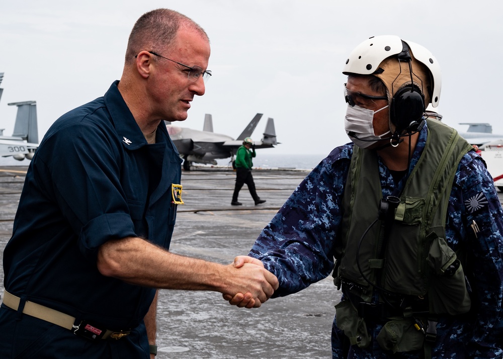 Rear Adm. Izura Ikeuchi, commander, Escort Flotilla Three, visits USS Carl Vinson (CVN 70)