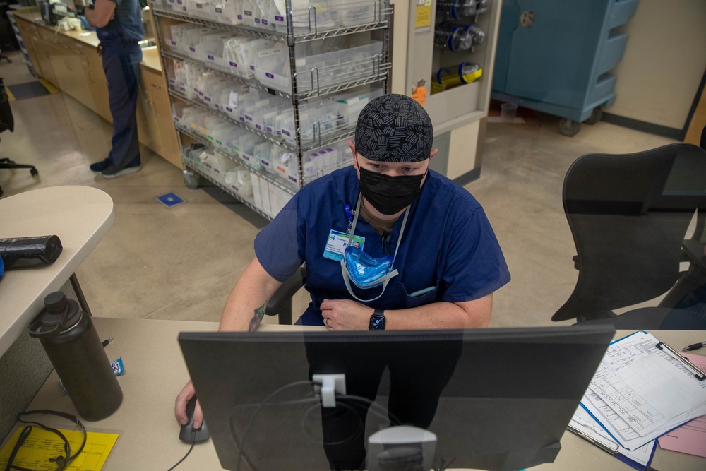 U.S. Army Medical Response Team Members Conduct Routine Hospital Work