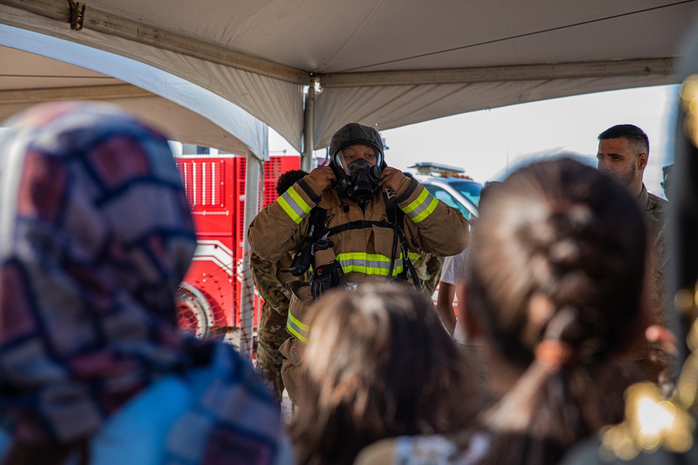 Task Force Holloman firefighters demonstrate fire safety for Afghan children