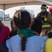 Task Force Holloman firefighters demonstrate fire safety for Afghan children