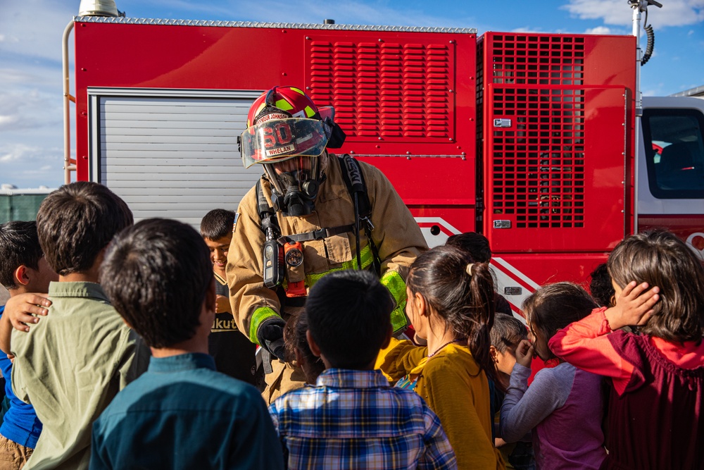 Task Force Holloman firefighters demonstrate fire safety for Afghan children