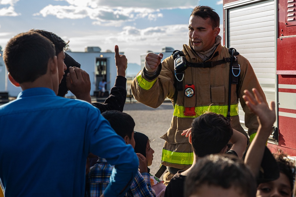 Task Force Holloman firefighters demonstrate fire safety for Afghan children