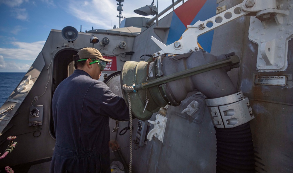 USS Billings Sailor Performs Maintenance on the Refueling Receptacle