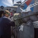 USS Billings Sailor Performs Maintenance on the Refueling Receptacle