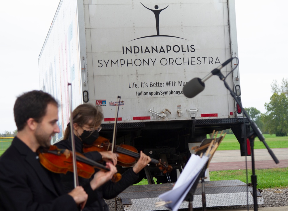 The Indianapolis Symphony Orchestra play music at Task Force Atterbury