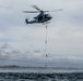 3rd MAW helo pulls Recon Marines out of water during wet SPIE rigging