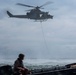 3rd MAW helo pulls Recon Marines out of water during wet SPIE rigging