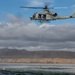 3rd MAW helo pulls Recon Marines out of water during wet SPIE rigging