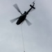 3rd MAW helo pulls Recon Marines out of water during wet SPIE rigging