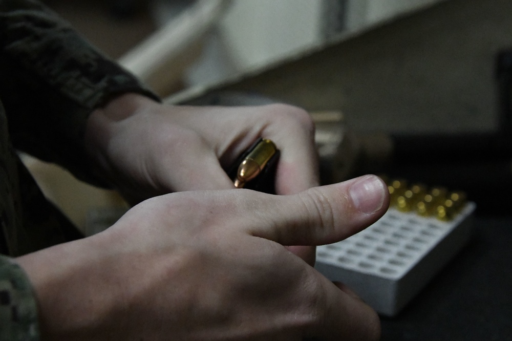 Sailor Prepares for Training with M18 Handgun