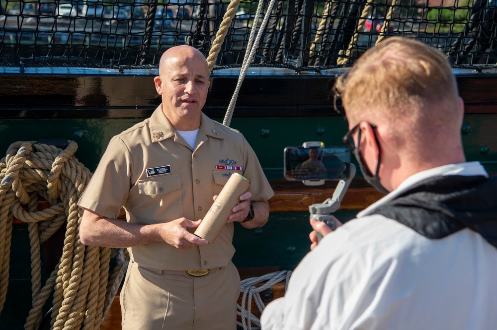Master Chief Petty Officer of the Navy (MCPON) Russell Smith dedicates a round during a 21-gun salute onboard USS Constitution