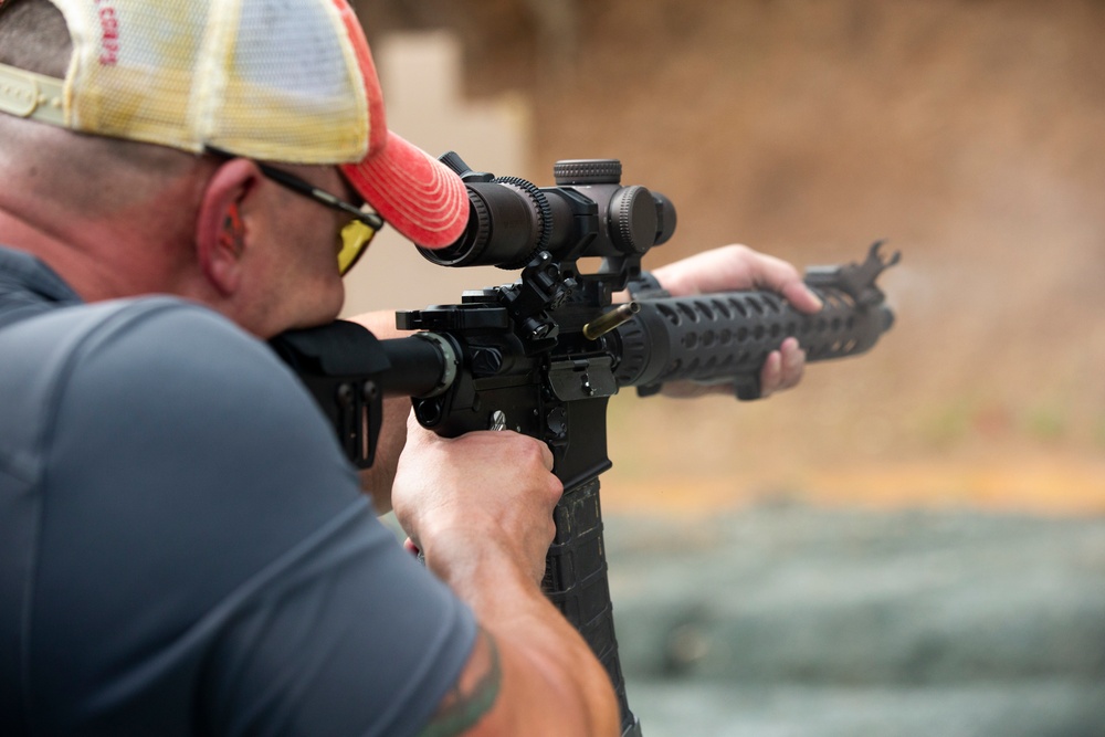 Marine Corps Reserve Action Shooting Team trains with the Marine Corps Action Shooting Team.