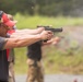 Marine Corps Reserve Action Shooting Team trains with the Marine Corps Action Shooting Team.