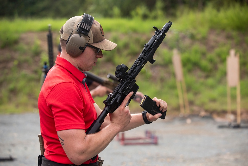 Marine Corps Reserve Action Shooting Team trains with the Marine Corps Action Shooting Team.