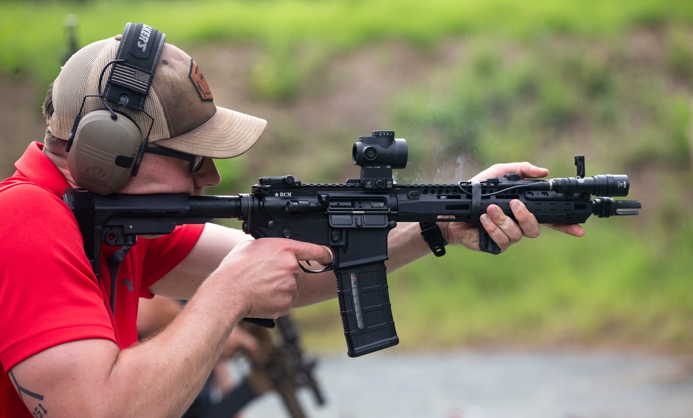 Marine Corps Reserve Action Shooting Team trains with the Marine Corps Action Shooting Team.