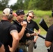 Marine Corps Reserve Action Shooting Team trains with the Marine Corps Action Shooting Team.