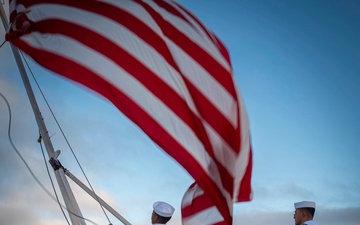 GHWB Sailors Hoist Holiday Ensign