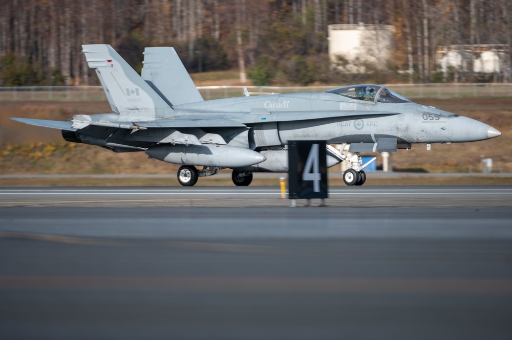 CF-188s and F-22s train together for operation Noble Defender