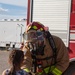 Task Force Holloman firefighters demonstrate fire safety for Afghan children