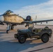 Idaho's A-10 Warthog painted to honor the WWII P-47 hangs out with a WWII Willys Jeep