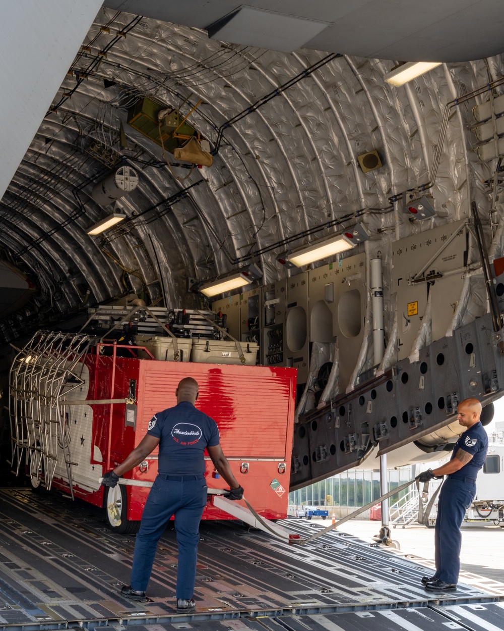 Thunderbirds unload cargo after arriving in Binghamton