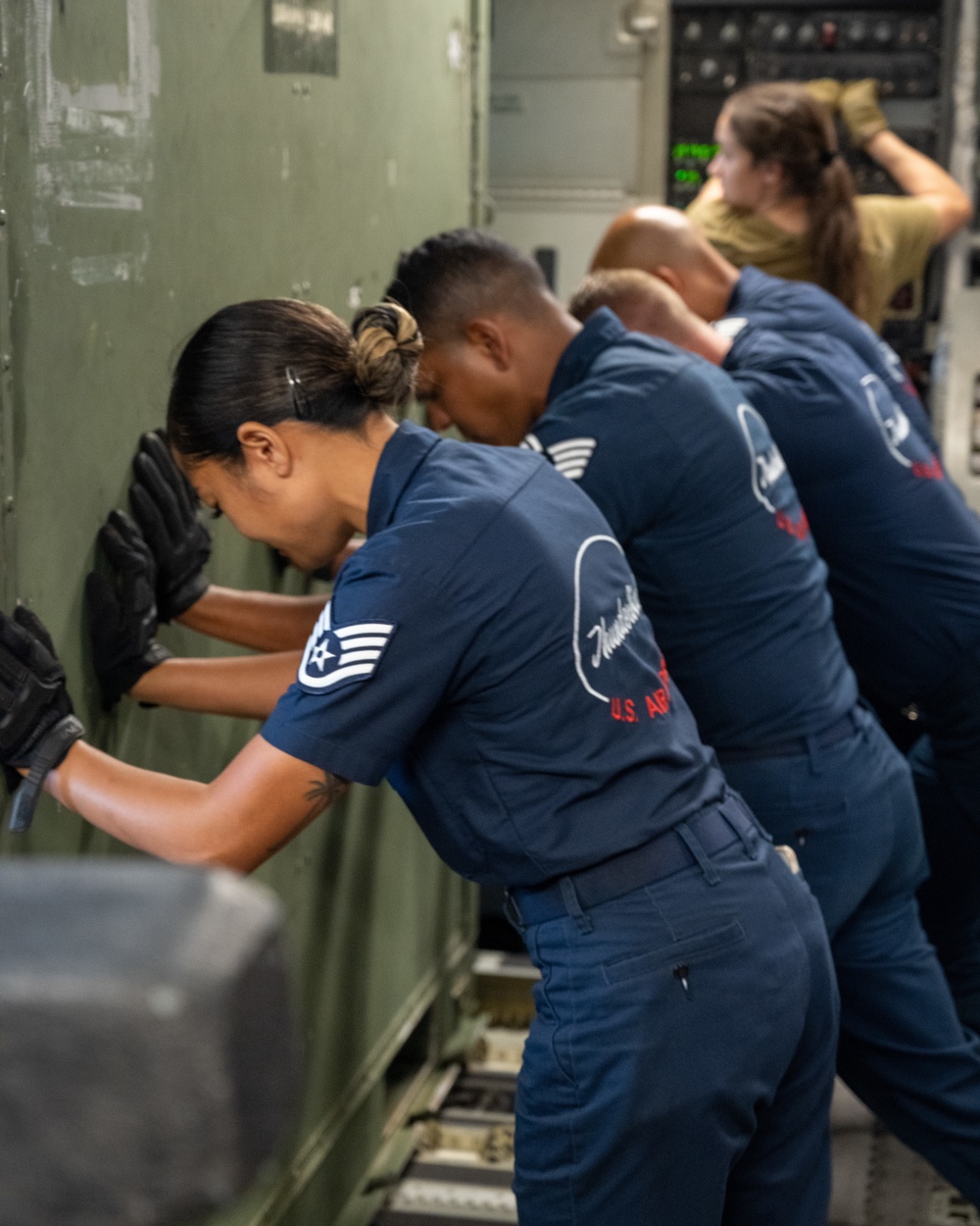 Thunderbirds unload cargo after arriving in Binghamton