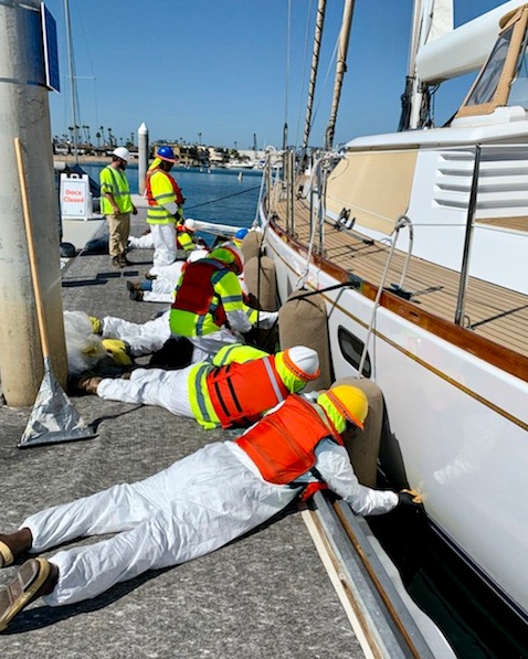 Clean Up Crews Decontaminate Oiled Vessels