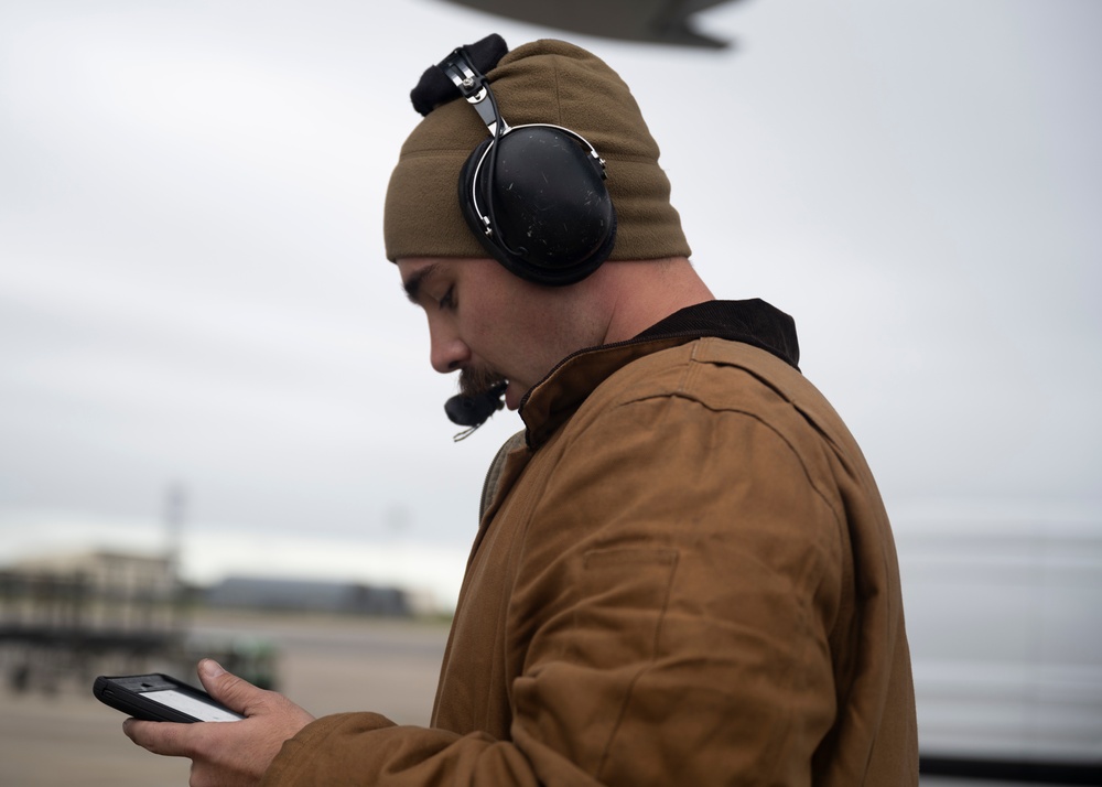 100th Aircraft Maintenance Squadron crew chief performs maintenance on a KC-135 boom.