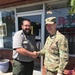 Cordell Hull Lake Park Ranger Luke Navarro shakes hands with a USACE Soldier