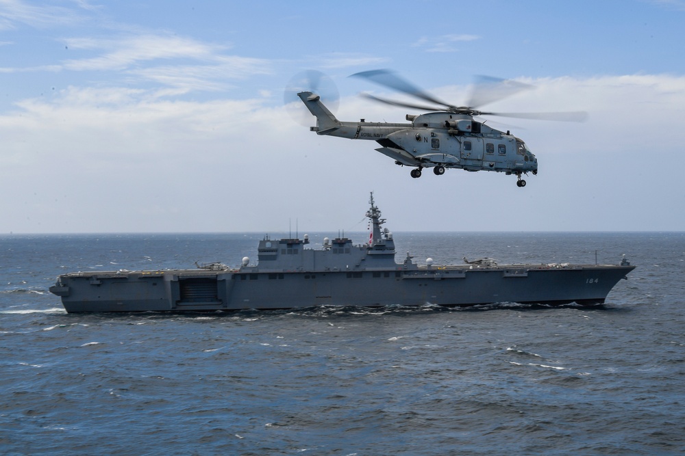 Sailors from U.K. Carrier Strike Group 21 tour USS Carl Vinson (CVN 70) as part of MPX 2021