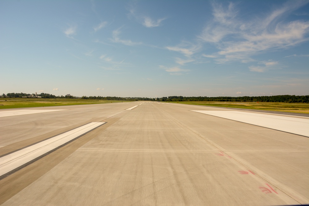 Flight carrying Air Force and Army leadership marks reopening of Pope Army Airfield