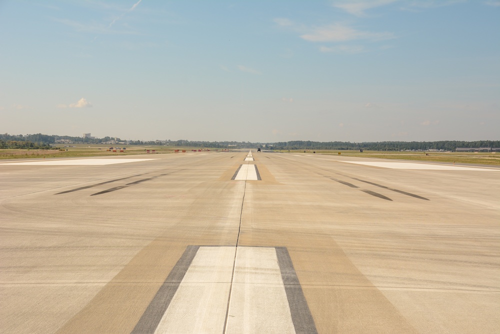 Flight carrying Air Force and Army leadership marks reopening of Pope Army Airfield