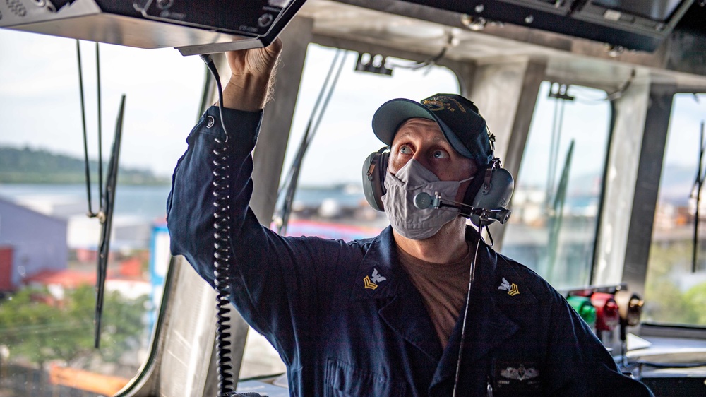 USS Charleston Sailor Conducts Communications Test