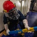 OS2 Adrian Godinezvega Conducts Shoring Repairs aboard the USS Dewey during a General Quarters Drill