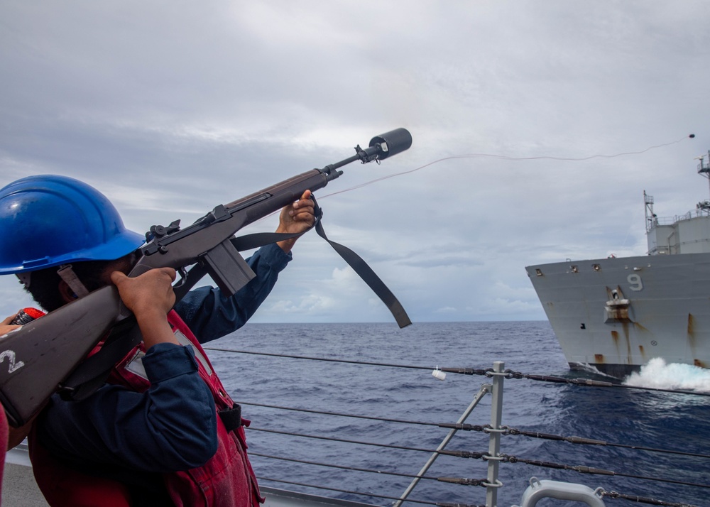 GMSN Raquell Carson Fires a Shot Line from the USS Dewey to the USNS Matthew Perry