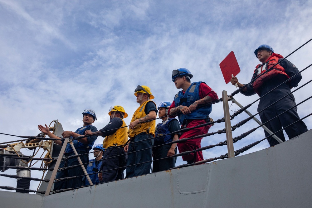 Sailors Aboard the USS Dewey Standby to Receive Fuel from the USNS Matthew Perry