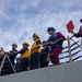 Sailors Aboard the USS Dewey Standby to Receive Fuel from the USNS Matthew Perry