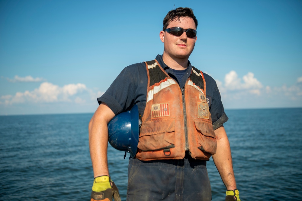 The crew aboard Coast Guard Cutter Axe