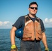 The crew aboard Coast Guard Cutter Axe