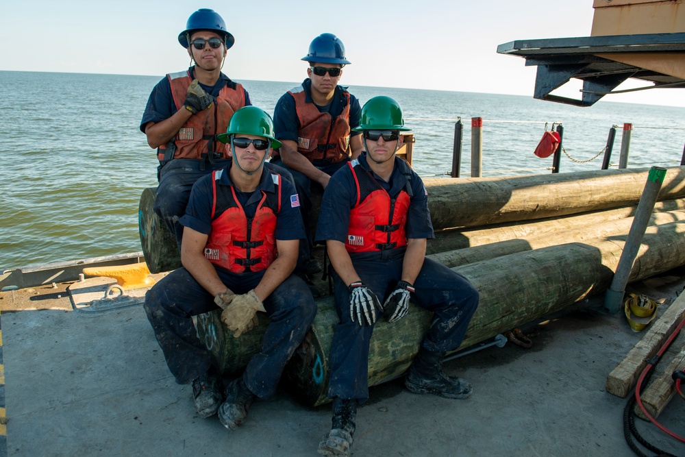 The crew aboard Coast Guard Cutter Axe