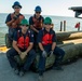 The crew aboard Coast Guard Cutter Axe