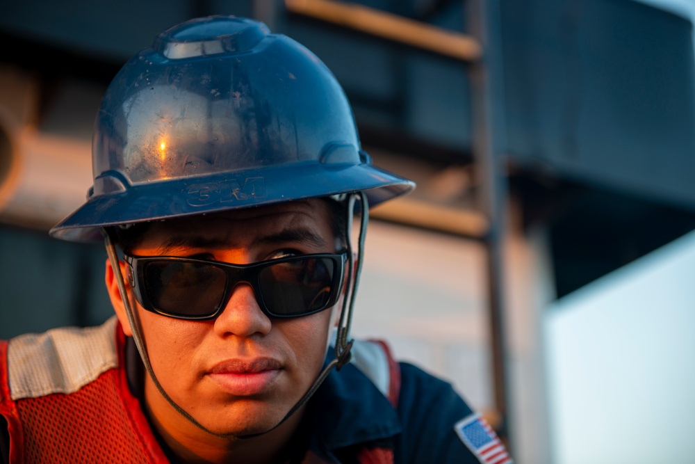 The crew aboard Coast Guard Cutter Axe