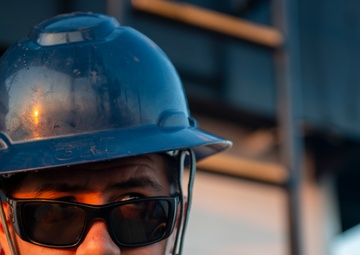 The crew aboard Coast Guard Cutter Axe
