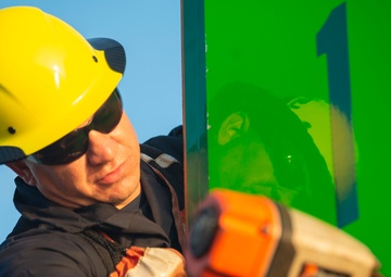 The crew aboard Coast Guard Cutter Axe