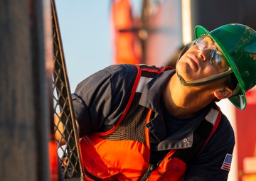 The crew aboard Coast Guard Cutter Axe